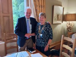 Iain Smith hands over to new President Mairhi Trickett